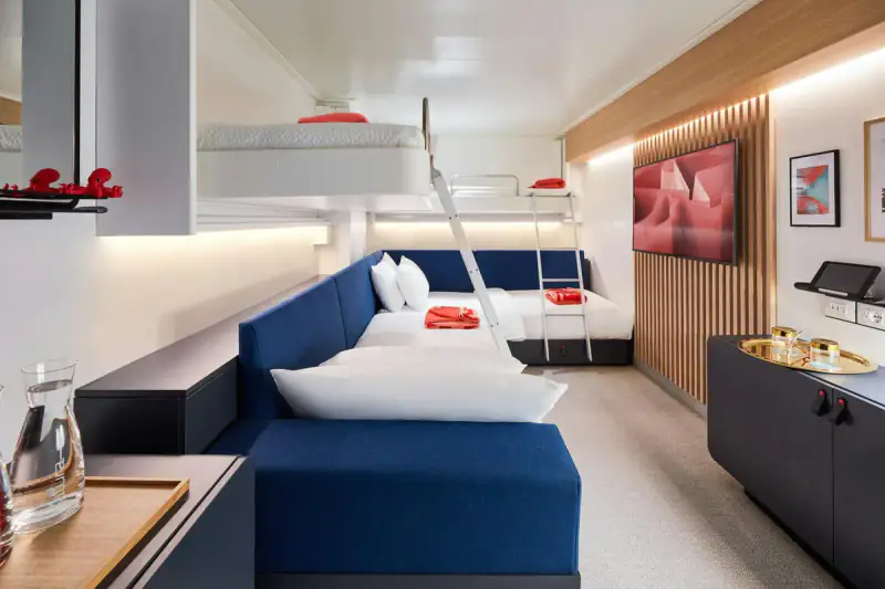 Virgin Voyages Social Insider cabin with beds and a raised bunk