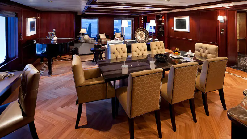 Penthouse Suite living and dining room on sister ship Celebrity Infinity, shown as a category example