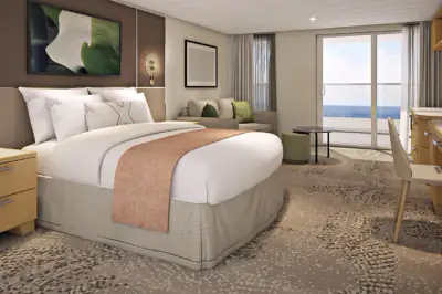 Renewed Panoramic Infinite Veranda Suite with king bed, sitting area, and sea view