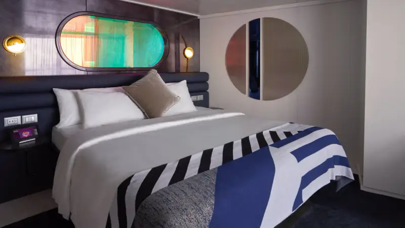 RockStar Quarters suite bedroom aboard Scarlet Lady