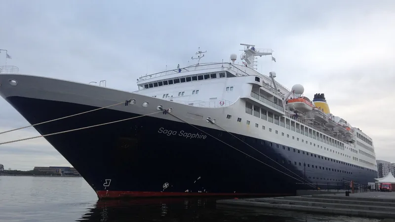 Saga Sapphire alongside Aalborg’s waterfront in 2019; a historical port view, not a photo of SH Diana or a future berth guarantee