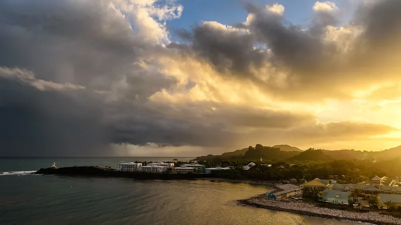 Amber Cove cruise terminal and green coastline at sunrise