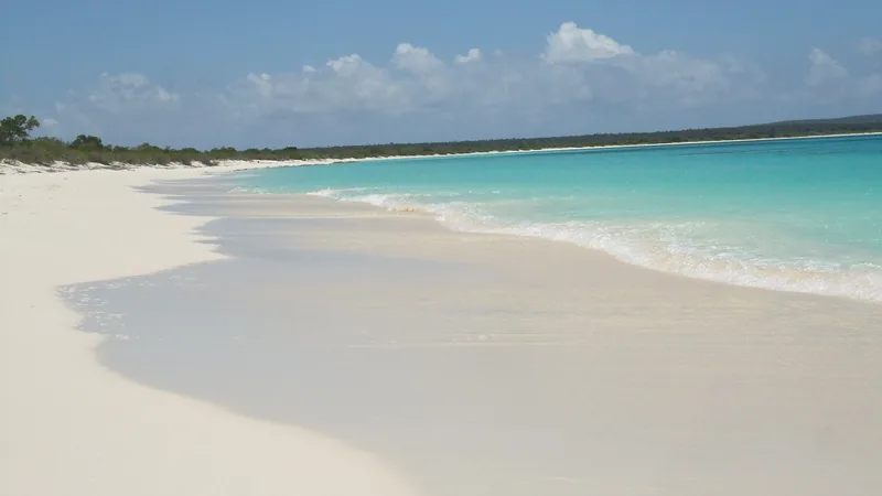 White sand and turquoise water at Bahía de las Águilas near Cabo Rojo
