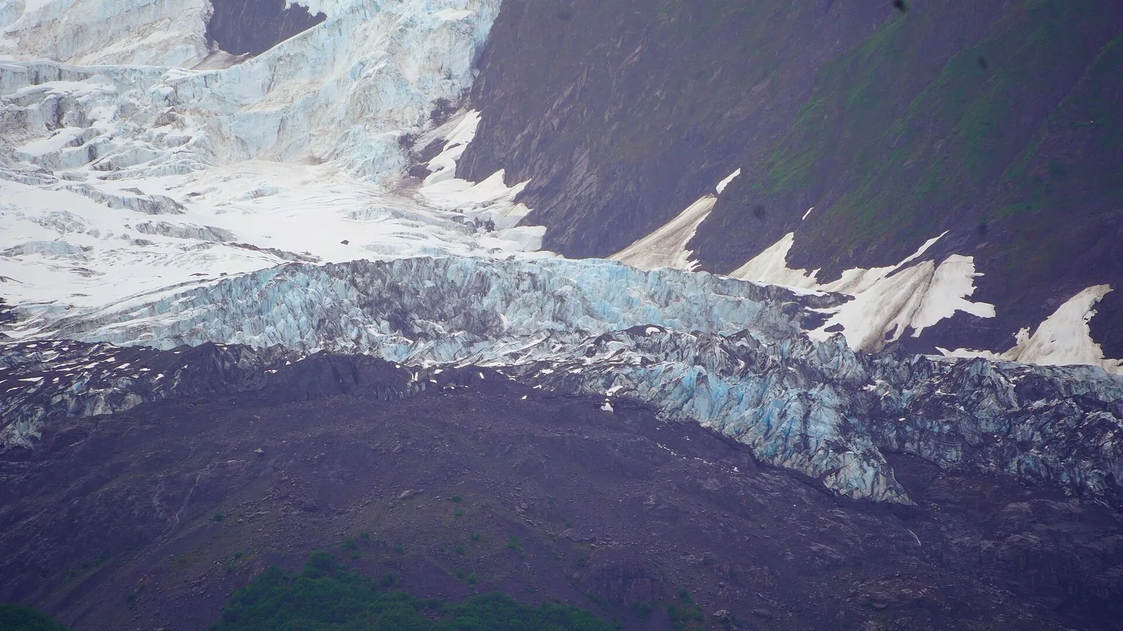 Vassar Glacier descending between the mountains of College Fjord