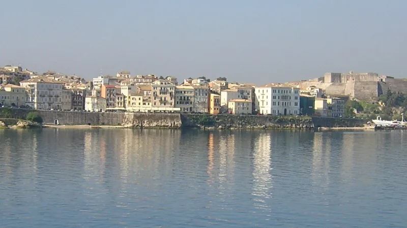 Corfu Old Town waterfront seen across the harbor