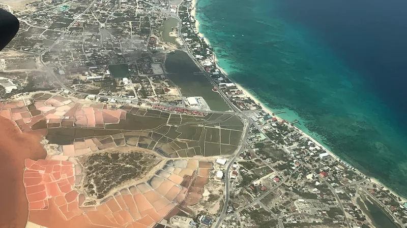 Aerial view of Grand Turk, its beach, reef, and turquoise water