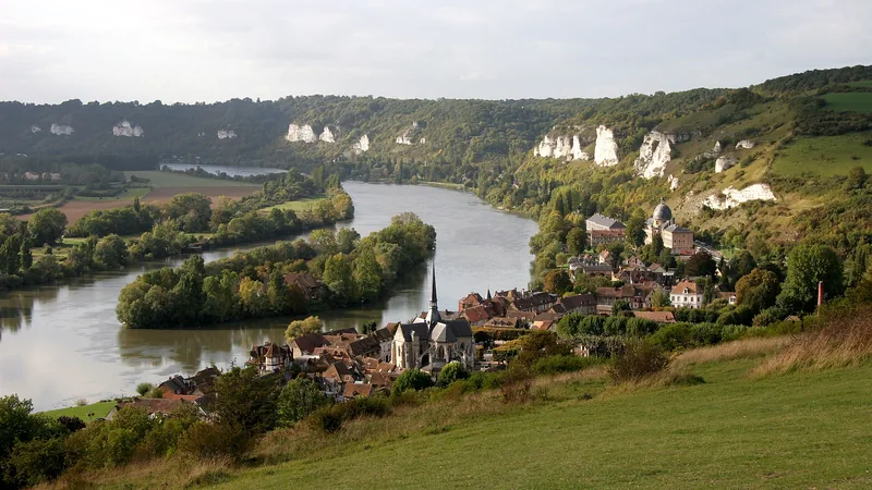 Petit Andely, its church, trees and a bend in the Seine seen from the Château Gaillard hillside in a historic photograph