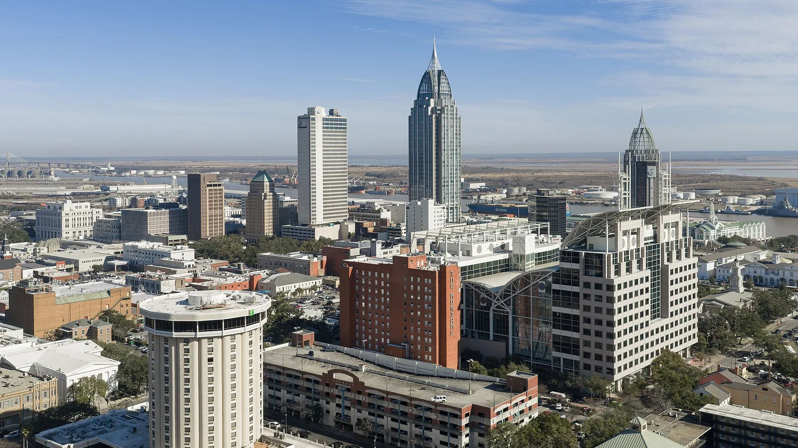 Aerial view of downtown Mobile, its river, port, and Gulf Coast wetlands