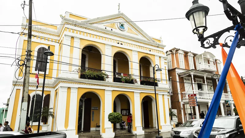 Bright yellow Victorian architecture in downtown Puerto Plata