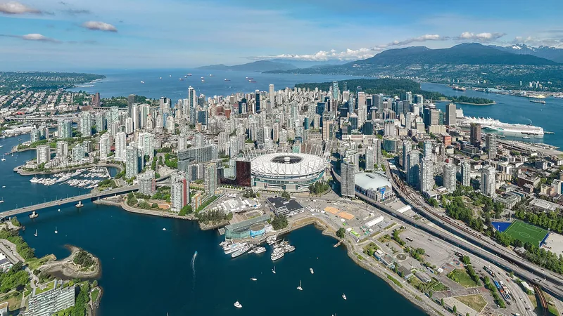 Vancouver skyline, Canada Place, harbor, and mountains