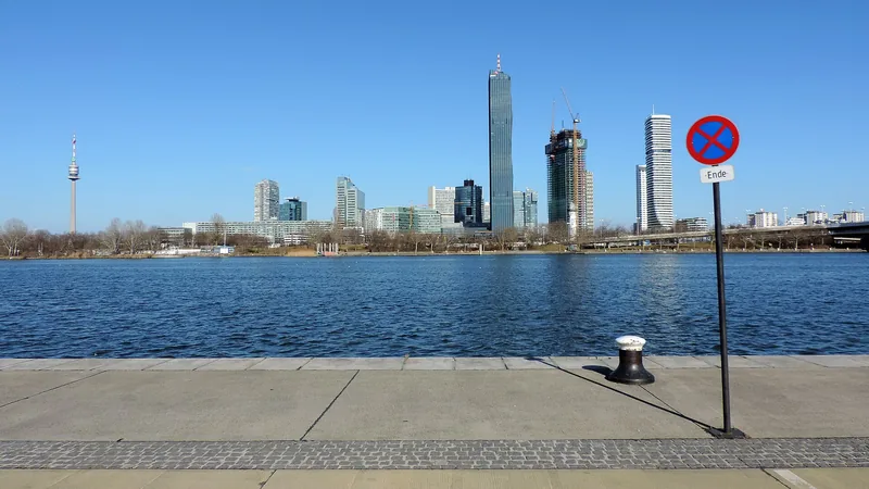 Vienna Danube skyline and modern towers beside the river